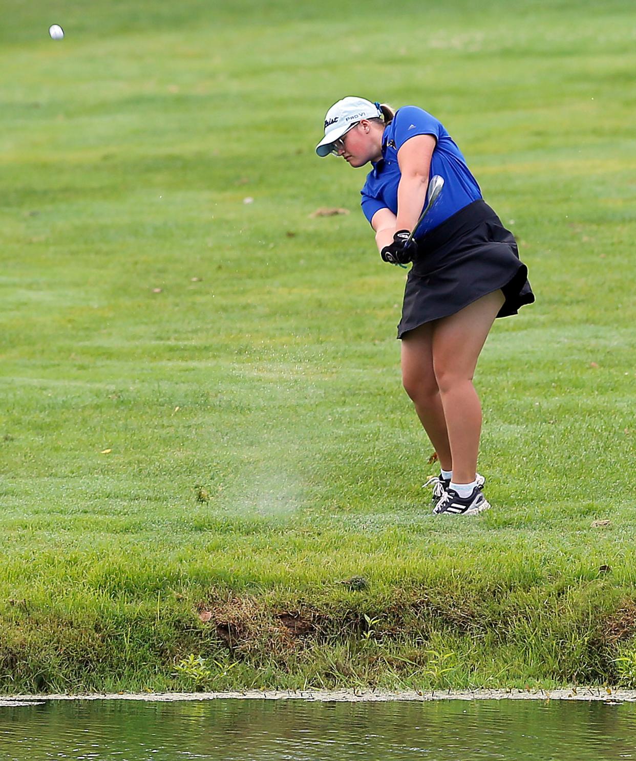 Wooster High School’s Payton Haynes hits her approach shot on number two during the 25th annual George Valentine Golf Invitational at Brookside Golf Course Monday Aug, 14, 2023. Photo by Tom E. Puskar