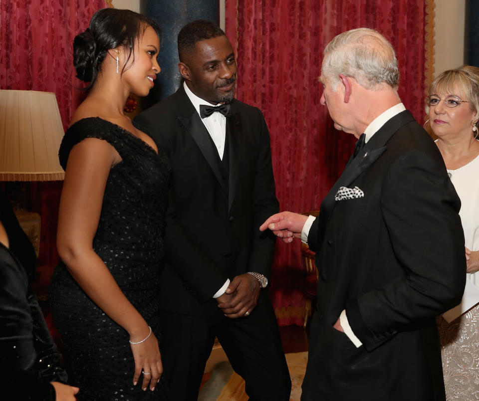 The 'Luther' star discussed Markle's upcoming royal wedding to Prince Harry at a dinner at Buckingham Palace, where he and girlfriend Sabrina Dhowre met Prince Charles.