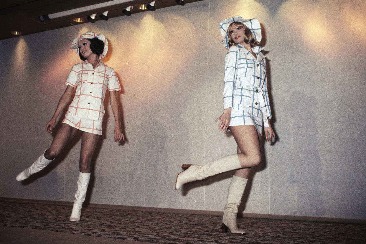 FILE - For spring 1975 dresses by Paris couturier Paco Rabanne in Paris in October 1974. The Spanish-born pace-setting designer Paco Rabanne known for perfumes sold worldwide and his metallic, space-age fashions, has died, the group that owns his fashion house announced on its website Friday Feb.3, 2023. He was 88. (AP Photo/Cardenas, File)