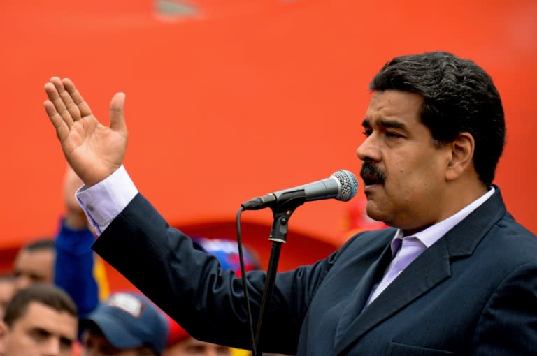 Venezuelan President Nicolas Maduro delivers a speech during a rally outside Miraflores presidential palace in Caracas on June 22, 2016