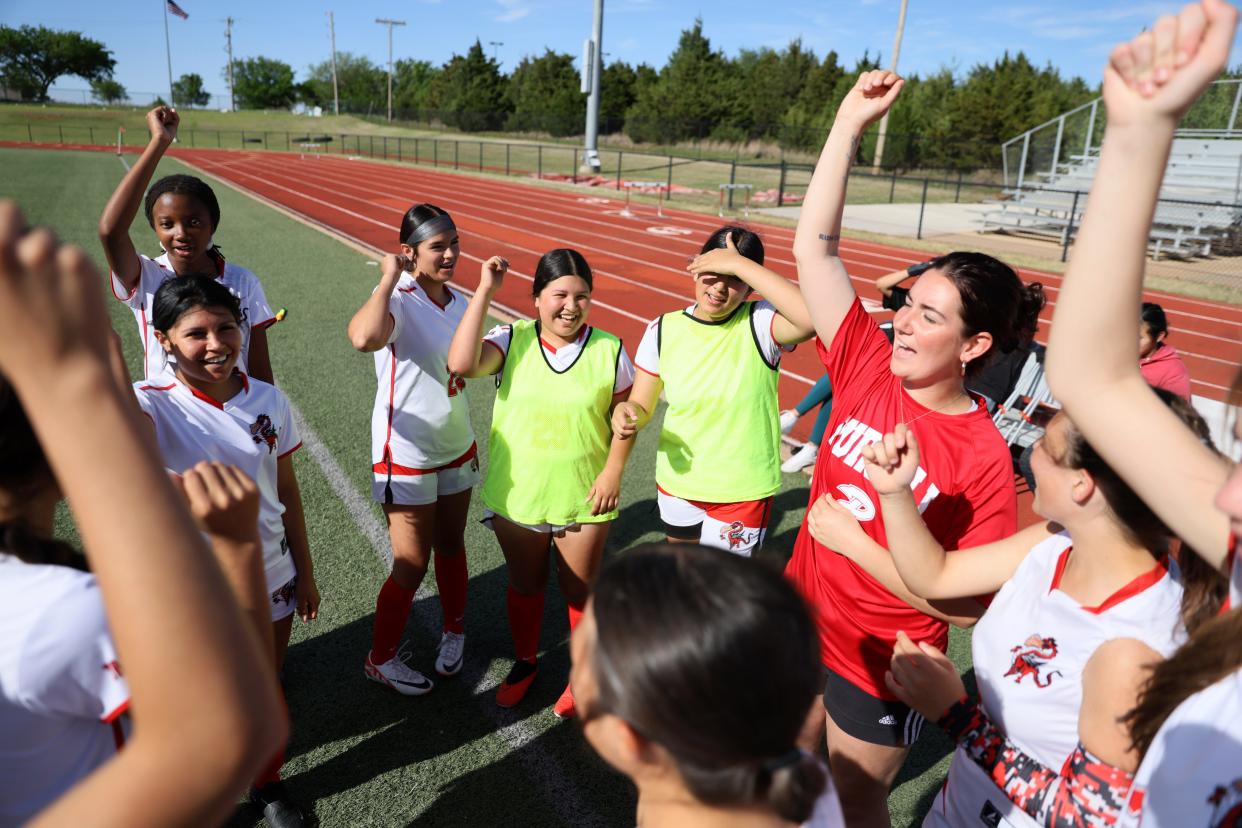 The Purcell girls socer team gathers before a girls soccer game against Crossings Christian in Oklahoma City, Tuesday, April 16, 2024.