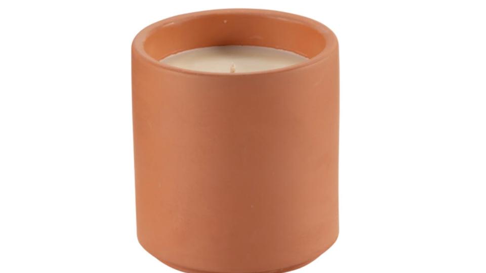 General Supply Goods + Co Terra Cotta Candle - Orange Citrus, $9. (Image via Staples Canada)