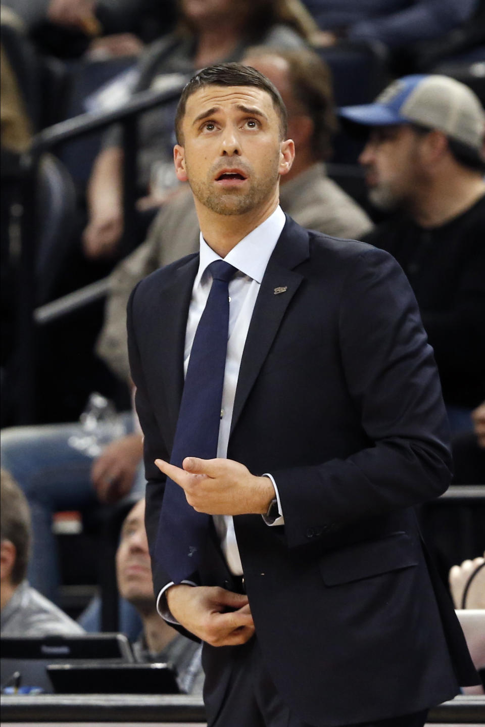 Minnesota Timberwolves head coach Ryan Saunders watches the scoreboard in the first half of an NBA basketball game against the Indiana Pacers, Wednesday, Jan. 15, 2020, in Minneapolis. (AP Photo/Jim Mone)