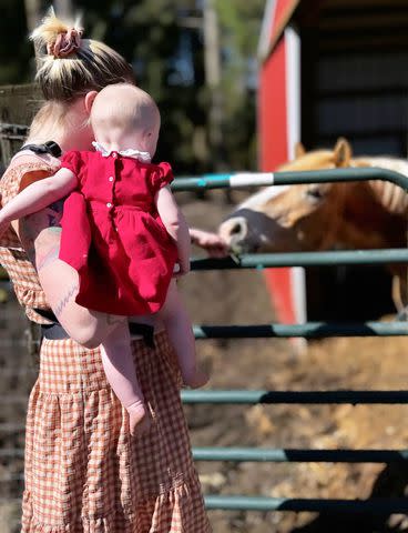 <p>Ireland Baldwin/Instagram</p> Ireland Baldwin with daughter Holland