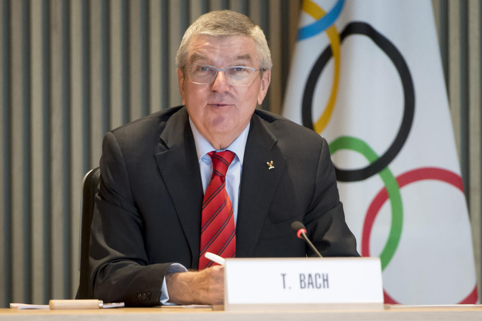 FILE - In this Oct. 2, 2019, file photo, International Olympic Committee president Thomas Bach speaks at the opening of the executive board meeting of the IOC at the Olympic House in Lausanne, Switzerland. The incoming leader of the World Anti-Doping Agency asked for more money. The International Olympic Committee said `yes.’ IOC president Thomas Bach pledged $10 million to fight doping in sports, half of which would go toward storing samples from pre-Olympics testing for 10 years and the other half toward investigations and research. (Laurent Gillieron/Keystone via AP, File)