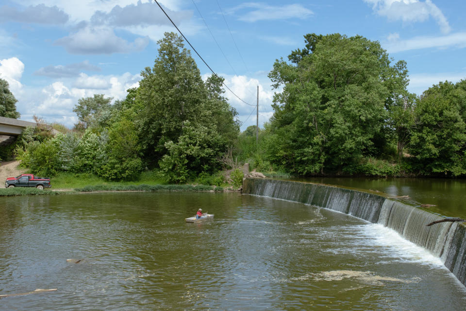 A man casts his line below the Robinson Dam in Robinson, Kentucky, on July 24, 2022. Brandon Holbert, 20, died at the dam in 2011 after falling.