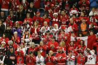 Supporters of Canada applaud before Canada plays Germany before their IIHF World Junior Championship ice hockey game in Malmo, Sweden, December 26, 2013. REUTERS/Alexander Demianchuk (SWEDEN - Tags: SPORT ICE HOCKEY)