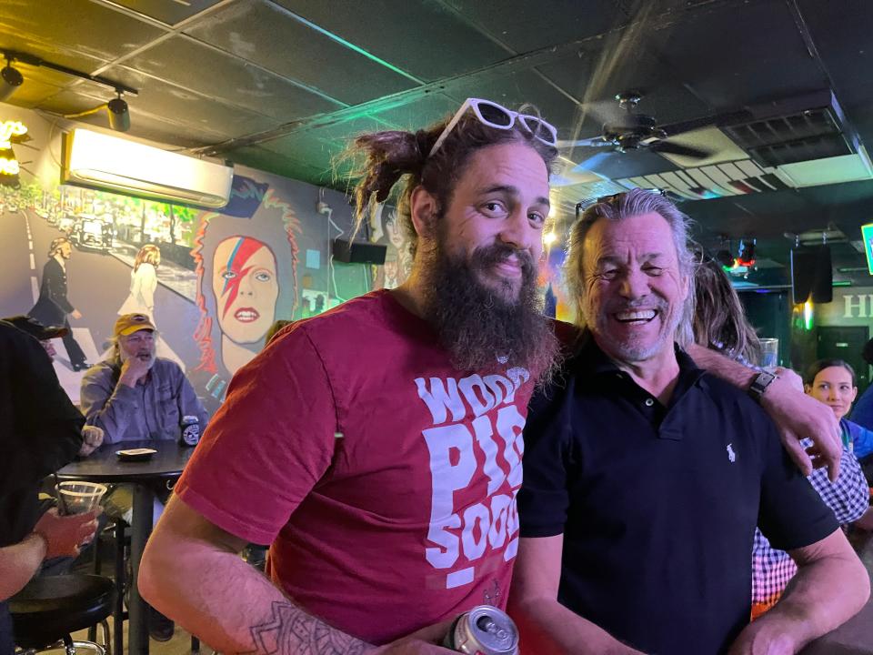 Jason Michael Webb and his dad Jim Webb watch an Arkansas men’s basketball victory over Louisiana State University Wednesday, March 2 at Hero’s Bar in the Fort Smith Downtown Entertainment District. PHOTO BY ROBERT MEDLEY / TIMES RECORD