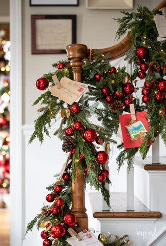 <p><a href="https://inspiredbycharm.com/staircase-christmas-garland/" data-component="link" data-source="inlineLink" data-type="externalLink" data-ordinal="1">Inspired By Charm</a></p>