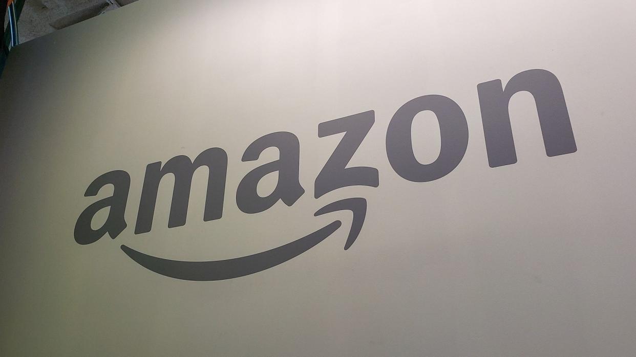  Amazon logo gray background. 