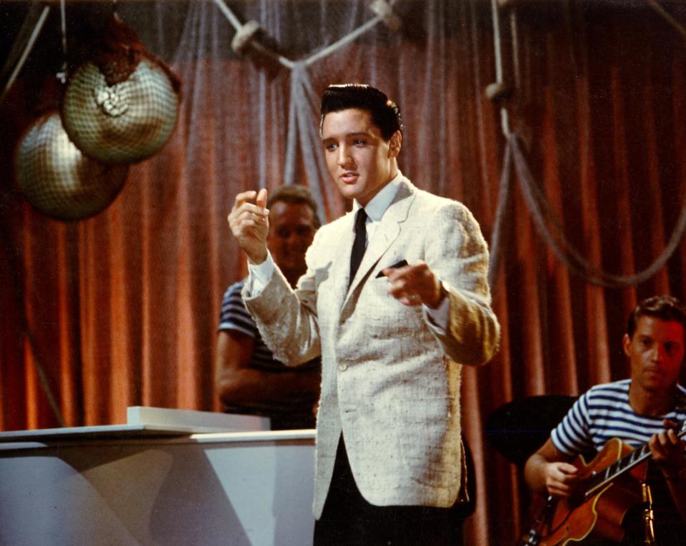 LOS ANGELES - APRIL 1962: Rock and roll singer Elvis Presley performs in the film "Girls Girls Girls" at Paramount Studios in April of 1962 in Los Angeles, California. (Photo by Michael Ochs Archives/Getty Images)