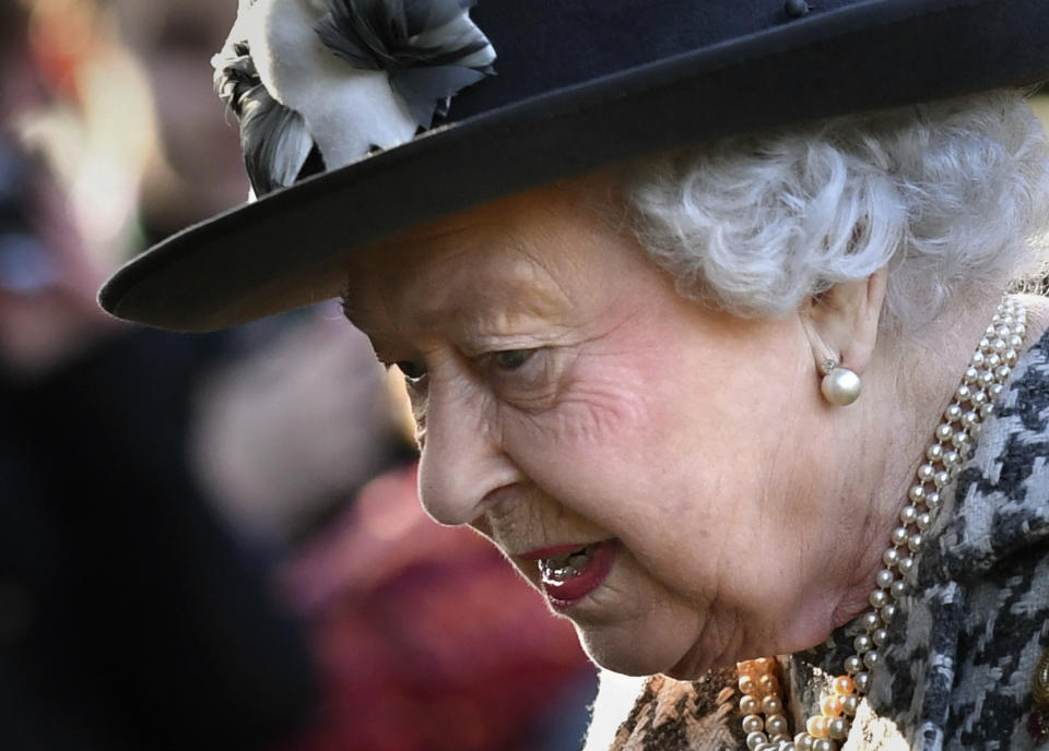 Britain's Queen Elizabeth II arrives at St Mary the Virgin, in Hillington, England, to attend a Sunday church service, Sunday, Jan. 19, 2020. Buckingham Palace says Prince Harry and his wife, Meghan, will no longer use the titles "royal highness" or receive public funds for their work under a deal that allows them to step aside as senior royals. (Joe Giddens/PA via AP)