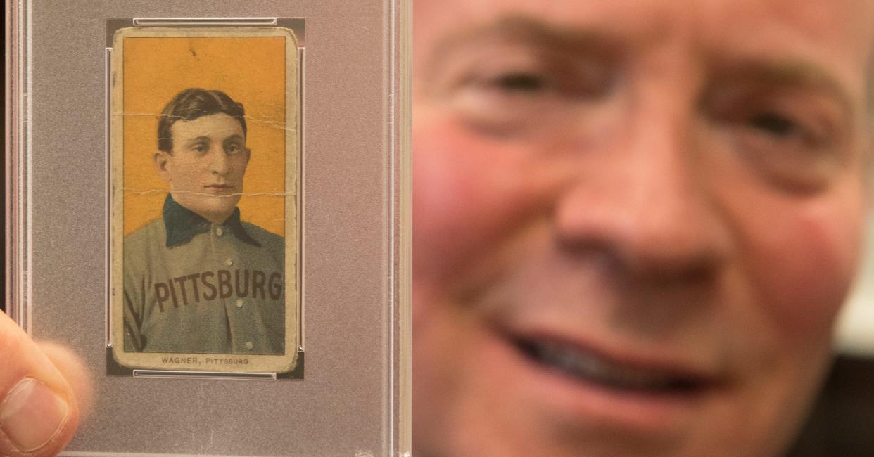 Ken Goldin, founder of Goldin Auctions in Runnemede, displays a 1909 Honus Wagner card valued at an estimated $5 million.  
