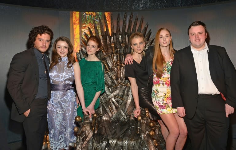 (L-R) Actors Kit Harington, Maisie Williams, Rose Leslie, Natalie Dormer, Sophie Turner, and John Bradley attend "Game Of Thrones" The Exhibition on March 27, 2013 in New York City
