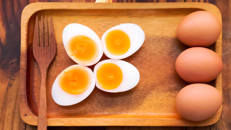 eggs on tray with fork