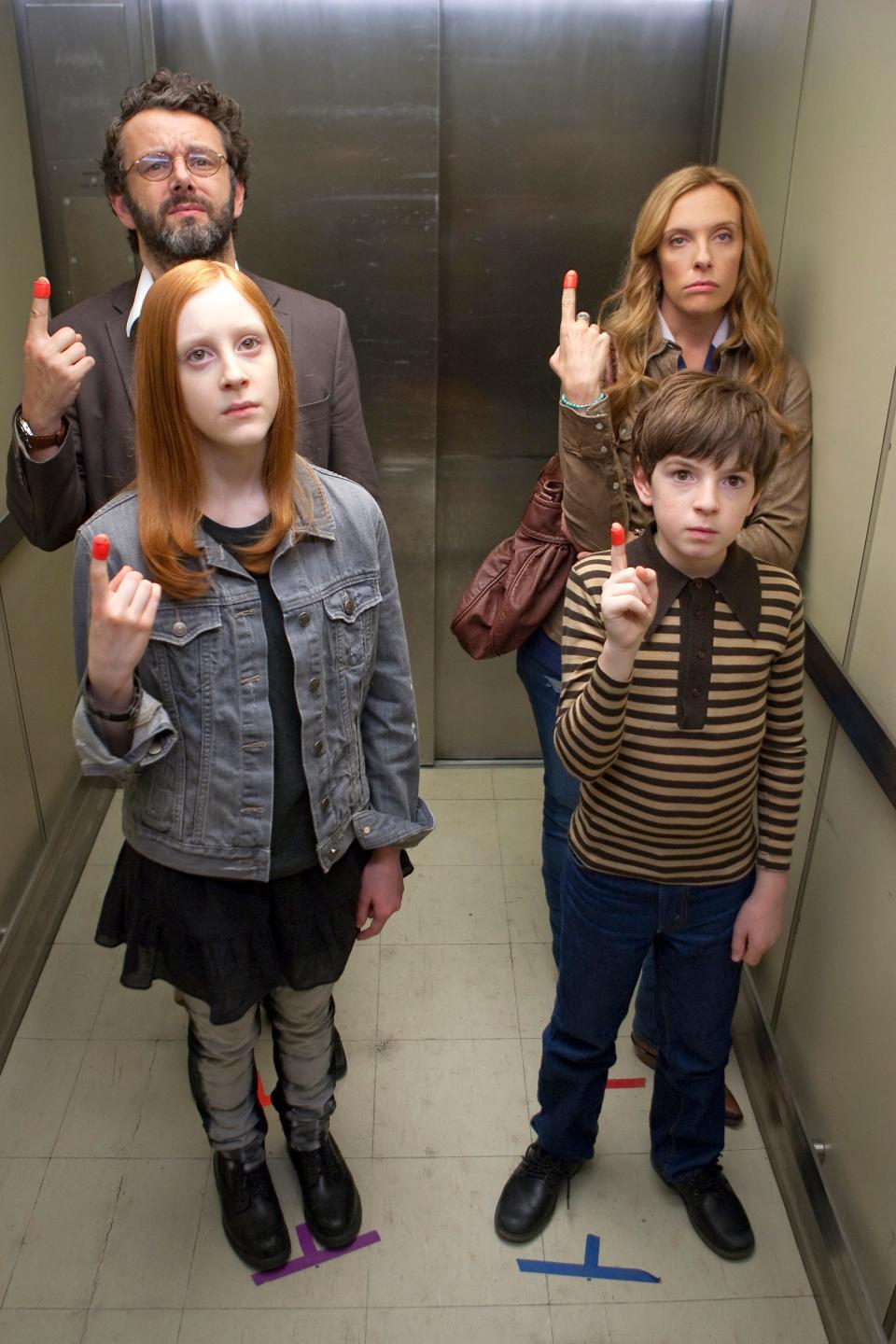 Clockwise from front left, Samantha Weinstein, Michael Sheen, Toni Collette and Jason Spevack in a scene from the motion picture "Jesus Henry Christ."