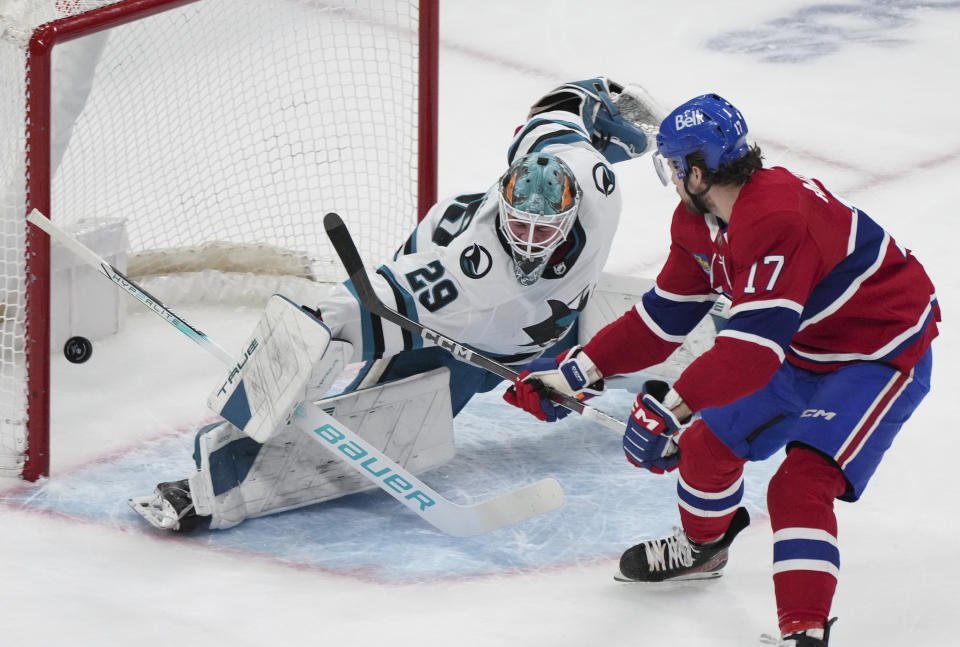 Montreal Canadiens' Josh Anderson (17) shoots wide of San Jose Sharks goaltender Mackenzie Blackwood (29) during first-period NHL hockey game action in Montreal, Thursday, Jan. 11, 2024. (Christinne Muschi/The Canadian Press via AP)