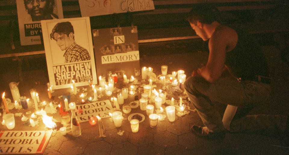 A vigil for Matthew Shepard in 1998, in the aftermath of his murder in Lamarie, Wyoming. 