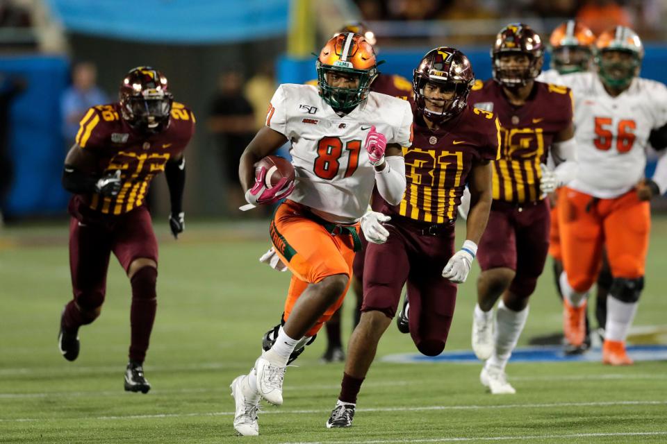 Florida A&M tight end Kamari Young (81) runs for a first down vs. Bethune-Cookman in the Florida Blue Florida Classic at Camping World Stadium in Orlando on Saturday, Nov. 23, 2019.