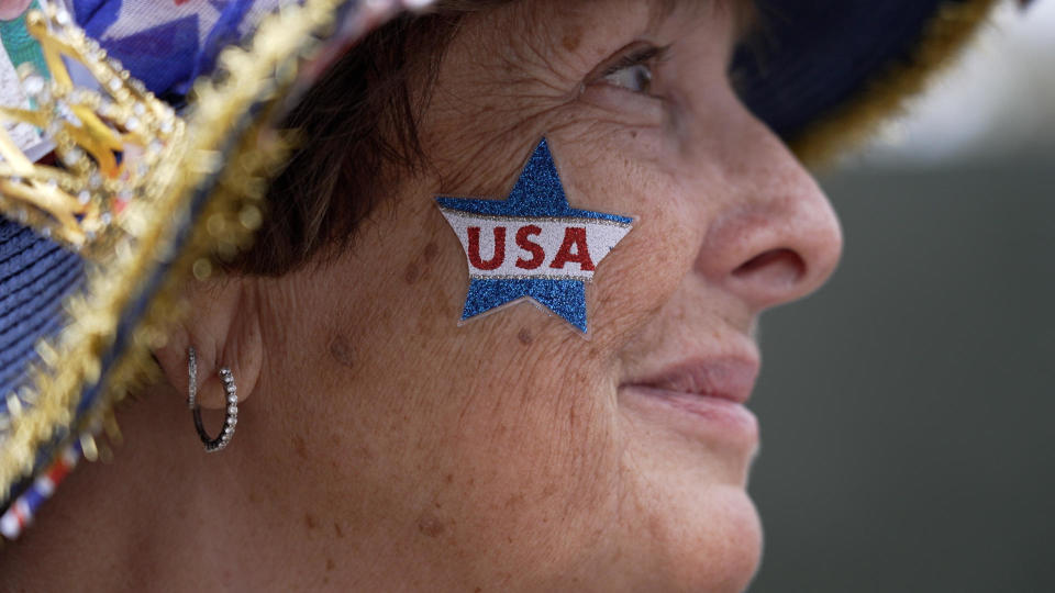 Donna Werner, of New Fairfield, Connecticut, stands near her tent on the edge of London's St. James' Park, on The Mall, May 2, 2023, securing her spot before King Charles III's coronation. / Credit: CBS News