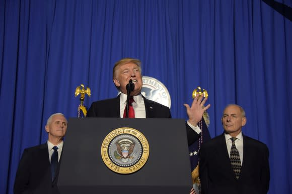 President Trump speaking at a podium and addressing Department of Homeland Security employees.