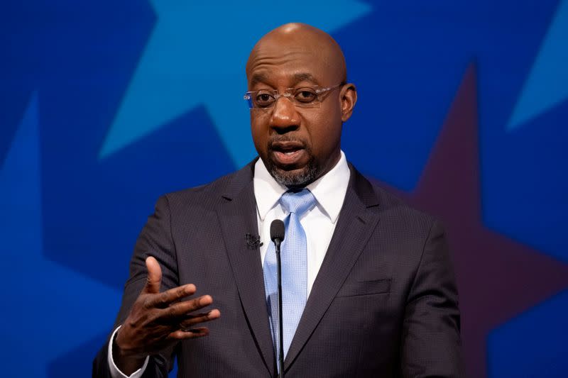 FILE PHOTO: Debate between Democratic challenger Raphael Warnock and Republican incumbent, Senator Kelly Loeffler for U.S. Senate seat representing Georgia