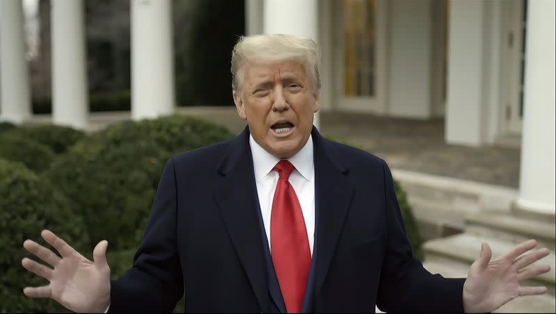 This photo shows President Donald Trump recording a video statement on the afternoon of Jan. 6, 2021, from the Rose Garden, displayed at a hearing by the House select committee investigating the Jan. 6 attack on the U.S. Capitol.