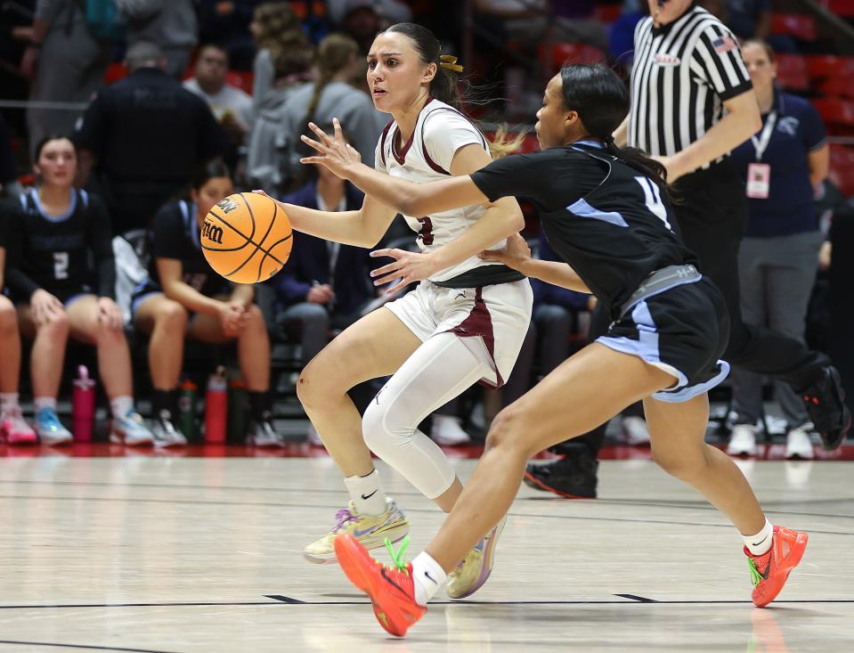 Lone Peak’s Shawnee Nordstrom moves around Westlake’s Jada Willis during a 6A girls quarterfinal basketball game at the Huntsman Center in Salt Lake City on Monday, Feb. 26, 2024. Lone Peak won 59-50. | Kristin Murphy, Deseret News