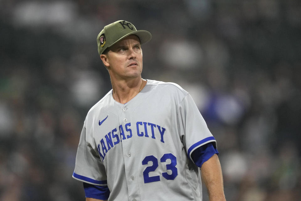 Kansas City Royals starting pitcher Zack Greinke looks at the scoreboard after the fourth inning of the team's baseball game against the Chicago White Sox on Friday, May 19, 2023, in Chicago. (AP Photo/Charles Rex Arbogast)