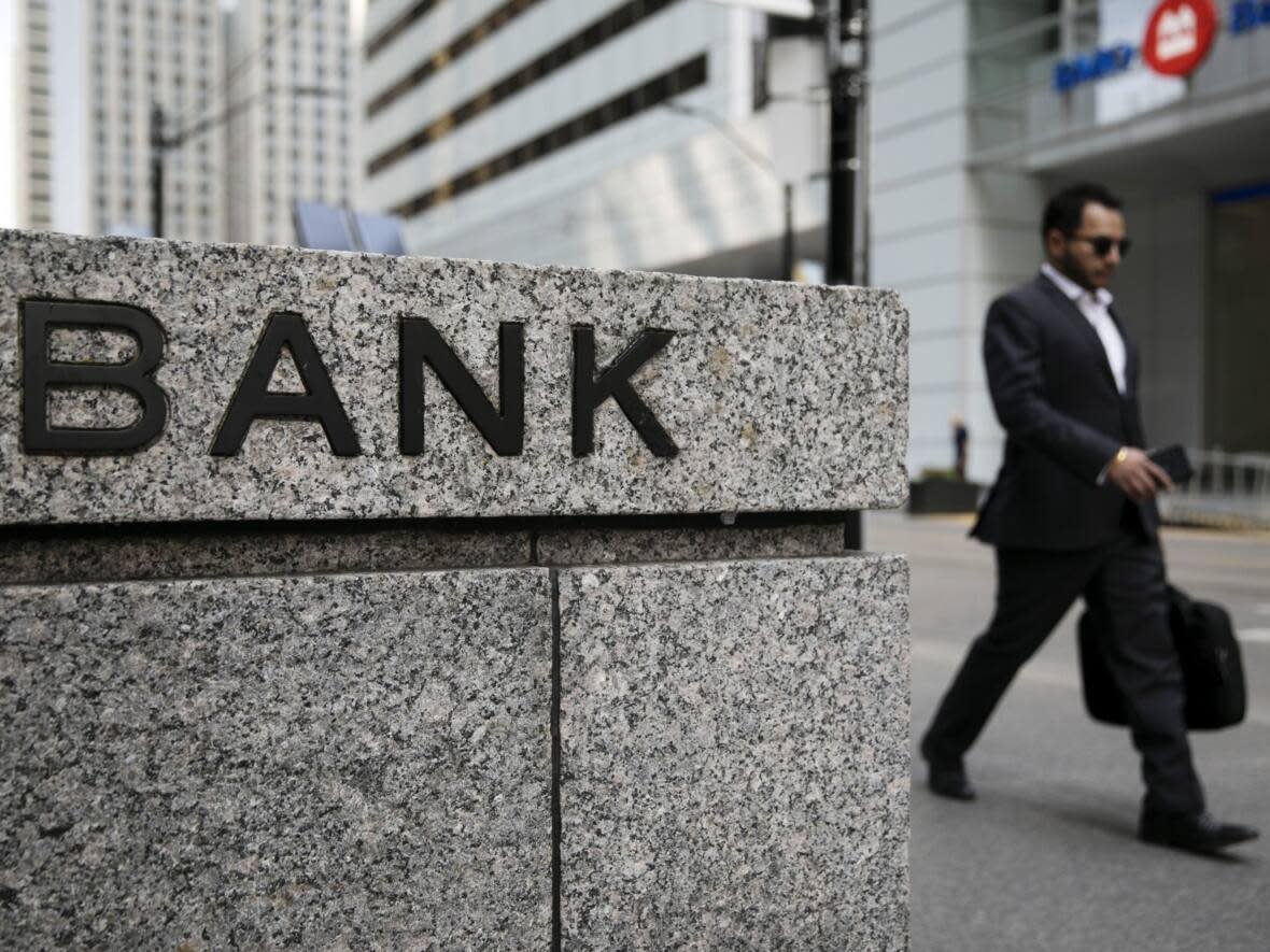 Canada's big banks are posting their quarterly profits this week and all of them are expected to raise their dividends for the first time in almost two years. (Brent Lewin/Bloomberg - image credit)