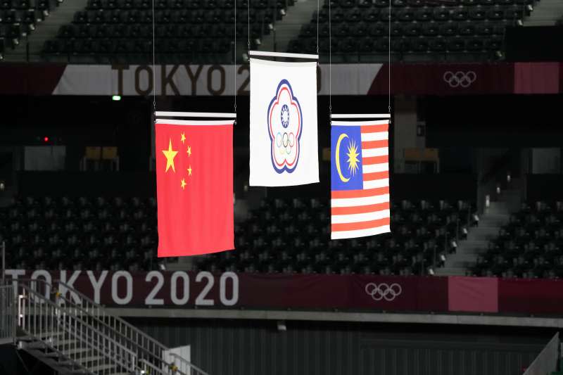 2021年7月31日，東京奧運，台灣羽球男子雙打王齊麟、李洋擊敗中國對手，奪下金牌（AP）
