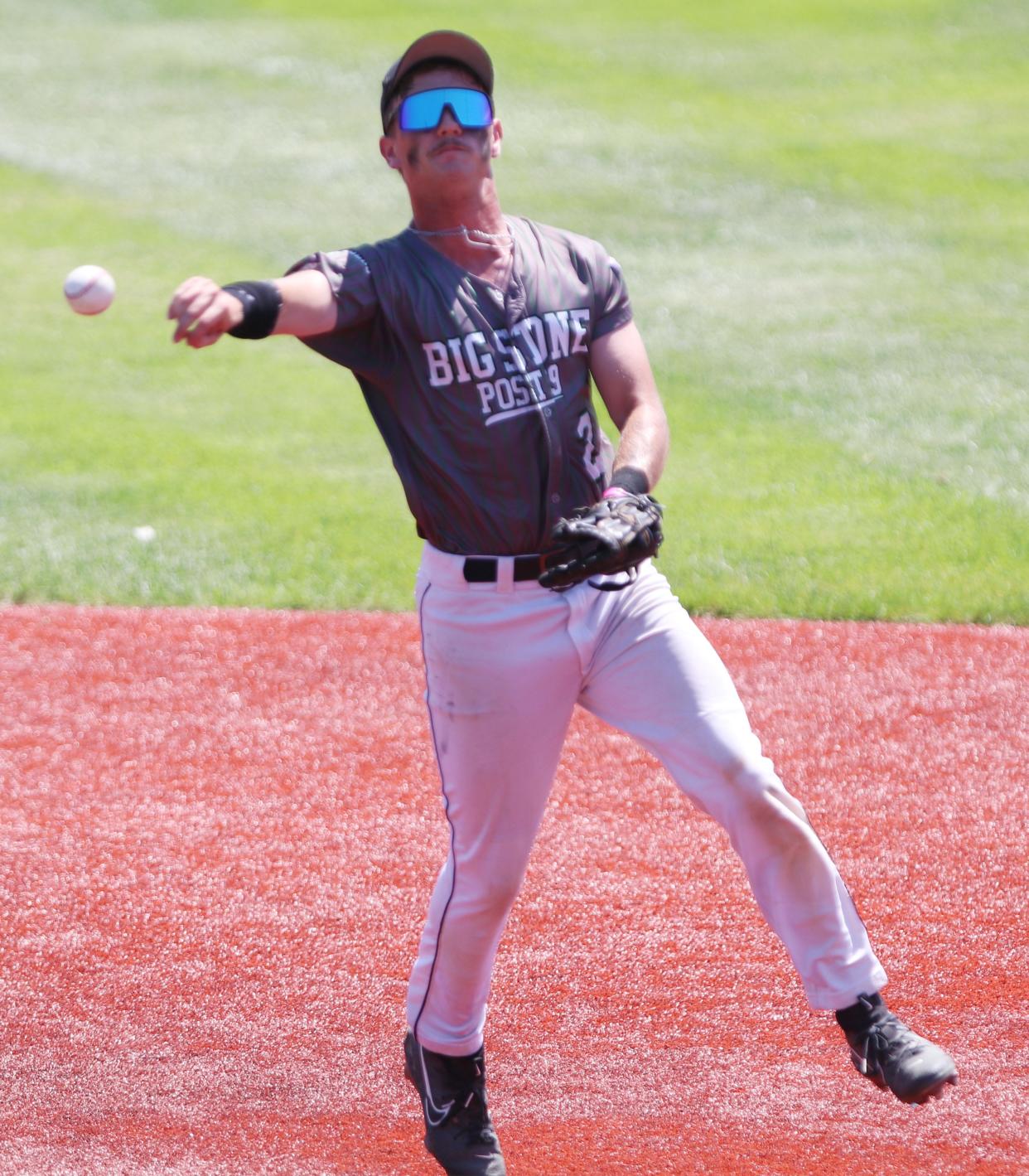 Big Stone City shortstop Dru Boots makes a running throw to first base during a game against Dell Rapids in the state Class B American Legion Baseball Tournament on Friday, Aug. 2, 2024 in Salem. Dell Rapids won 10-0 in five innings.