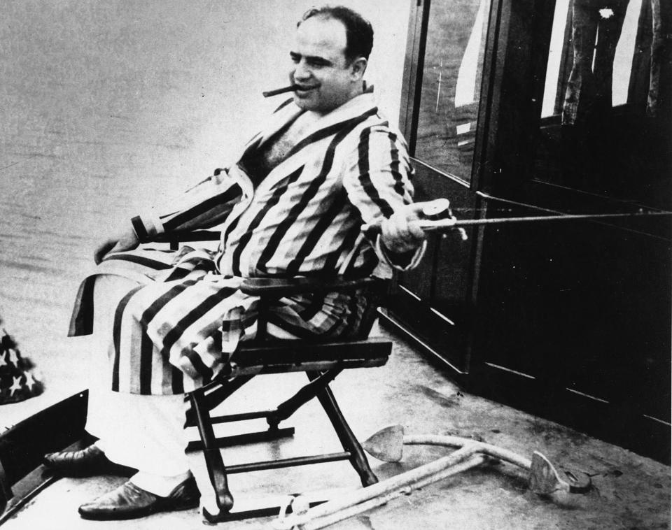 The real Al Capone, seen fishing off Palm Island, Florida.