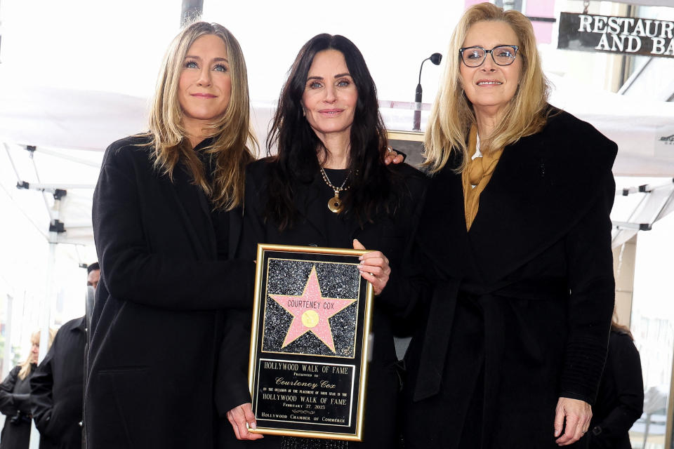 <p>Actors Courteney Cox, Jennifer Aniston, and Lisa Kudrow pose during Courteney Cox's star unveiling ceremony on the Hollywood Walk of Fame in Los Angeles, California, U.S., February 27, 2023. REUTERS/Mario Anzuoni</p> 