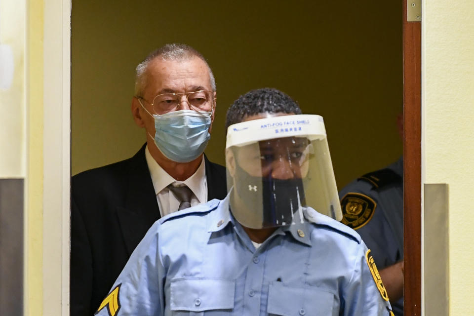 Subordinate of former head of Serbia's state security service Jovica Stanisic, Franko "Frenki" Simatovic, appears in court at the UN International Residual Mechanism for Criminal Tribunals (IRMCT) in The Hague, Netherlands, Wednesday June 30, 2021. A UN court is delivering judgments in the retrial of Jovica Stanisic and Franko Simatovic, accused of organizing, arming and supporting Serb paramilitaries that committed atrocities in Croatia and Bosnia as Yugoslavia crumbled in the early 1990s. (Piroschka van de Wouw/Pool via AP)