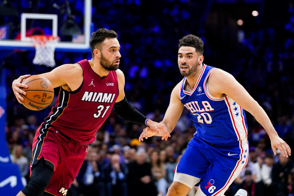 Miami Heat's Max Strus (31) drives past Philadelphia 76ers' Georges Niang during the first half of Game 6 of an NBA basketball second-round playoff series, Thursday, May 12, 2022, in Philadelphia. (AP Photo/Matt Slocum)