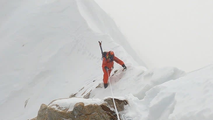 Adrian Ballinger ascends Makalu with his skis.