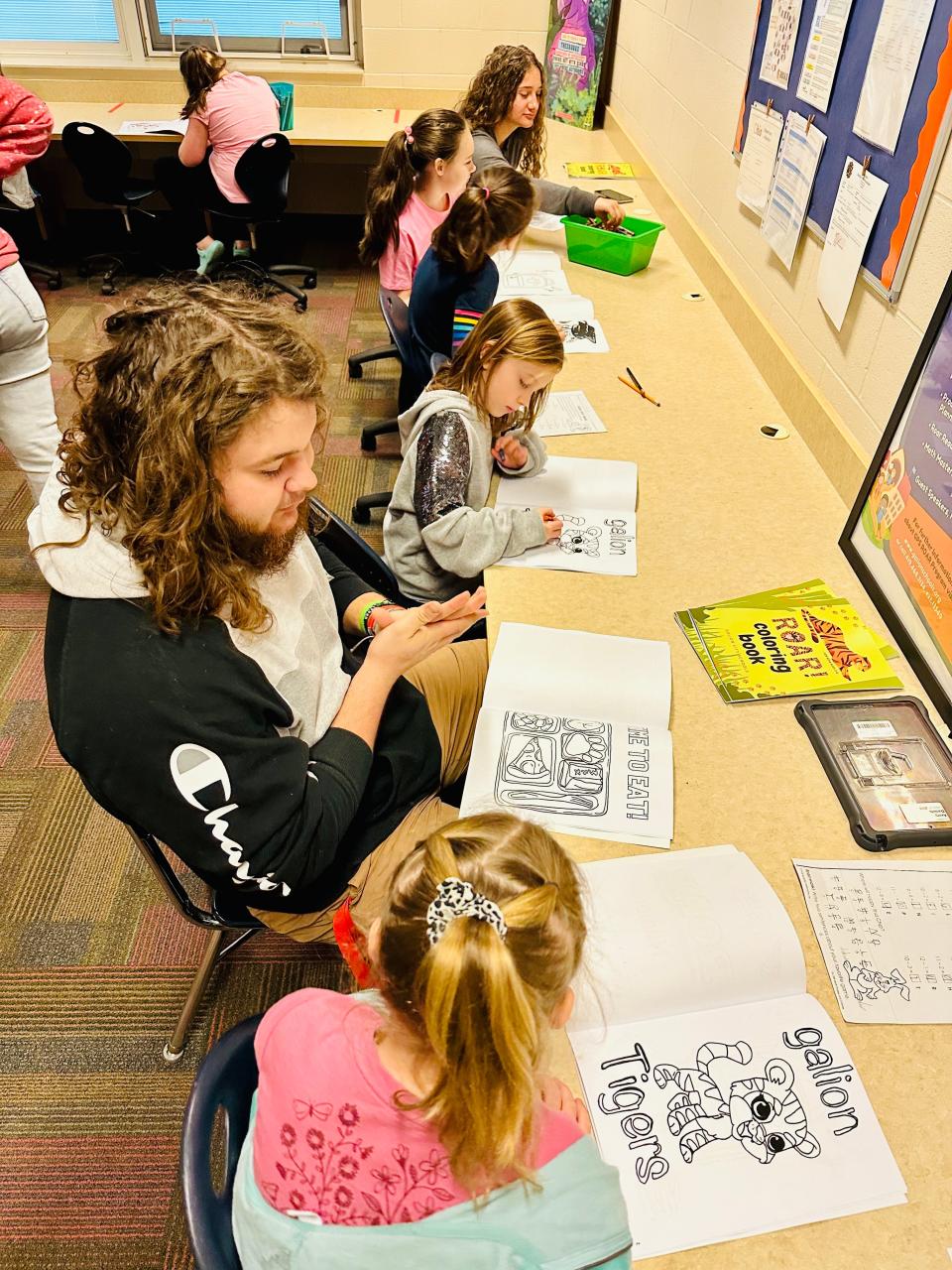 Some members of the Galion ROAR art clubs personally delivered copies of their coloring book to Primary School students.