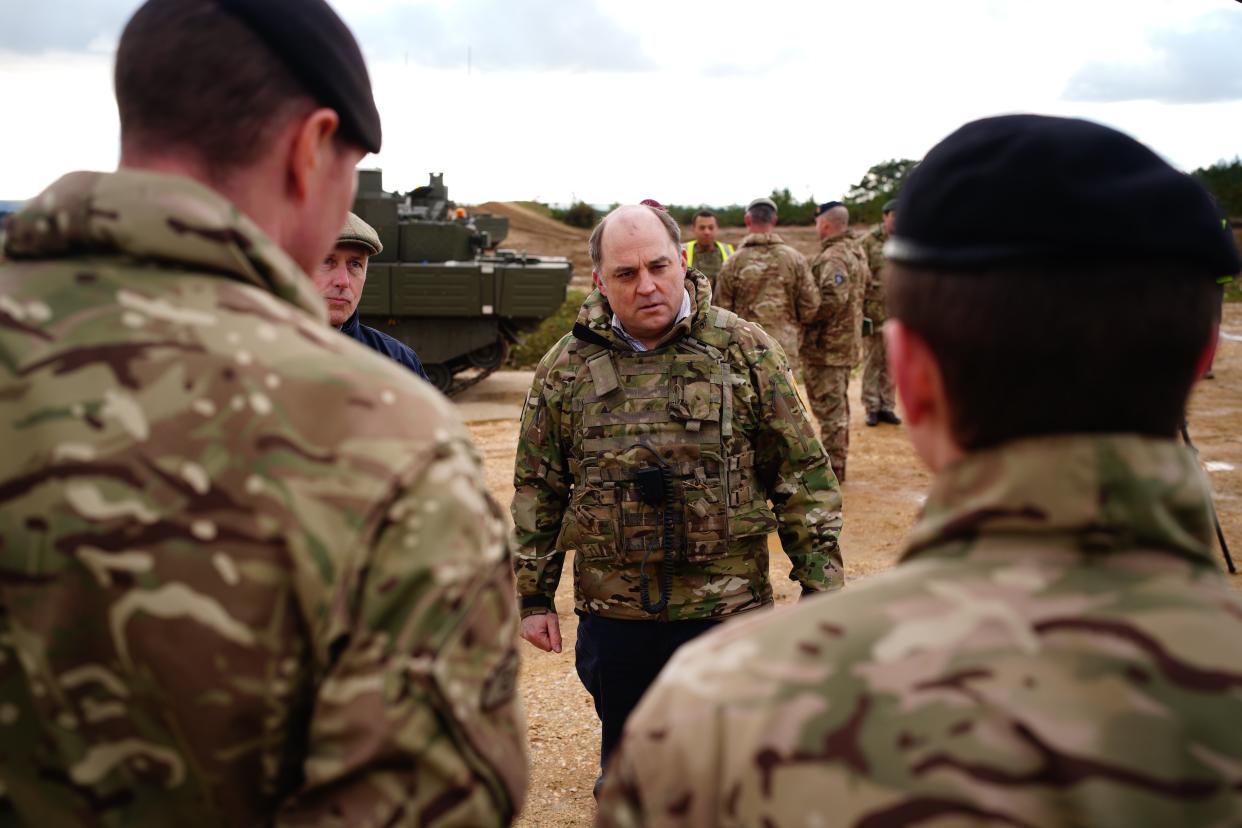 Defence secretary Ben Wallace meeting the crew of an Ajax Ares armored personnel carrier during a visit to Bovington Camp in Bovington, Dorset. British defence secretary Ben Wallace is visiting a British Army military base in Dorset to see Ukrainian soldiers train on Challenger 2 tanks. (Getty Images)