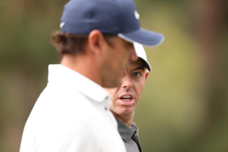 LOS ANGELES, CALIFORNIA - JUNE 15: Brooks Koepka of the United States and Rory McIlroy of Northern Ireland walk to the 13th tee during the first round of the 123rd U.S. Open Championship at The Los Angeles Country Club on June 15, 2023 in Los Angeles, California. (Photo by Sean M. Haffey/Getty Images)