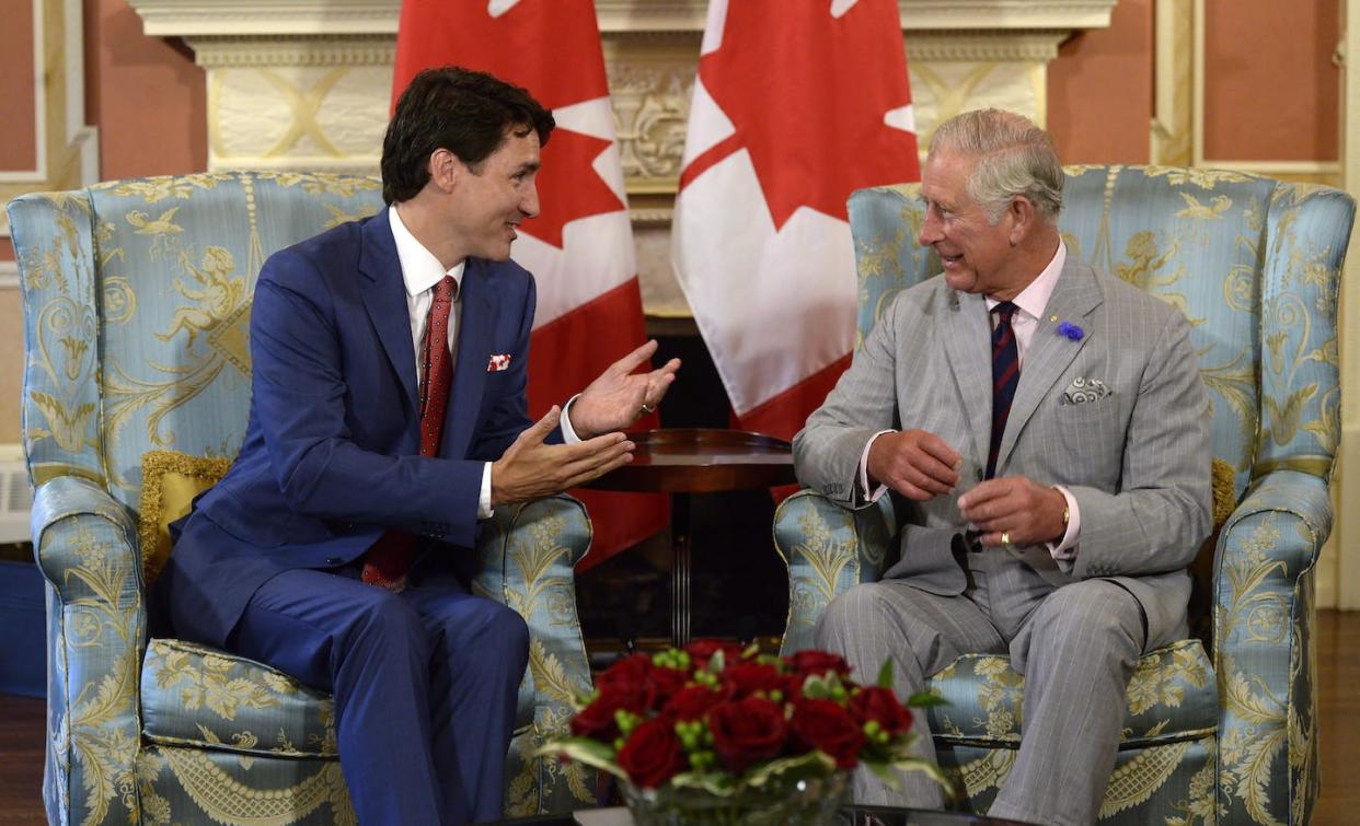 Prime Minister Justin Trudeau and Prince Charles, now King Charles, speak at Rideau Hall in Ottawa on July 1, 2017. THE CANADIAN PRESS/Adrian Wyld