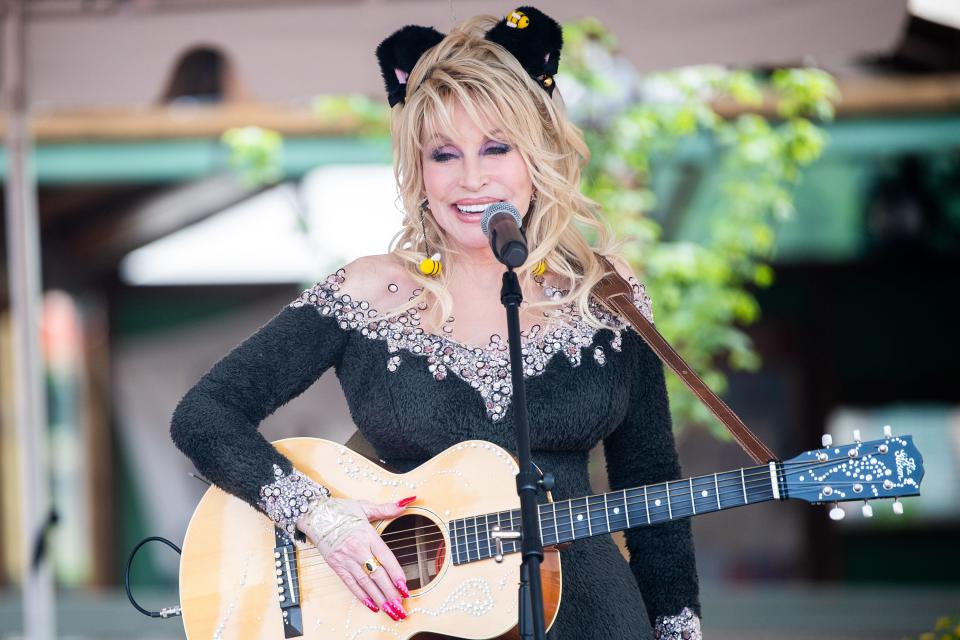 Dolly Parton sings a song written specifically for Big Bear Mountain during the grand opening of the rollercoaster in Dollywood's Wildwood Grove on Friday, May 12, 2023. 