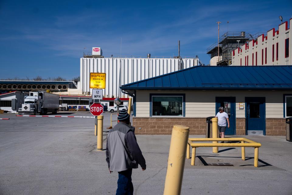 Employees leave Tyson Food's Perry pork packing plant after the company announced the location's closure Monday, March 11, 2024.