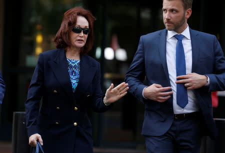 Kathleen Manafort leaves the Federal Courthouse during the second day of jury deliberations in the trial against Paul Manafort, President Trump's former campaign chairman who is facing bank and tax fraud charges, in Alexandria, Virginia, U.S., August 17, 2018. REUTERS/Joshua Roberts