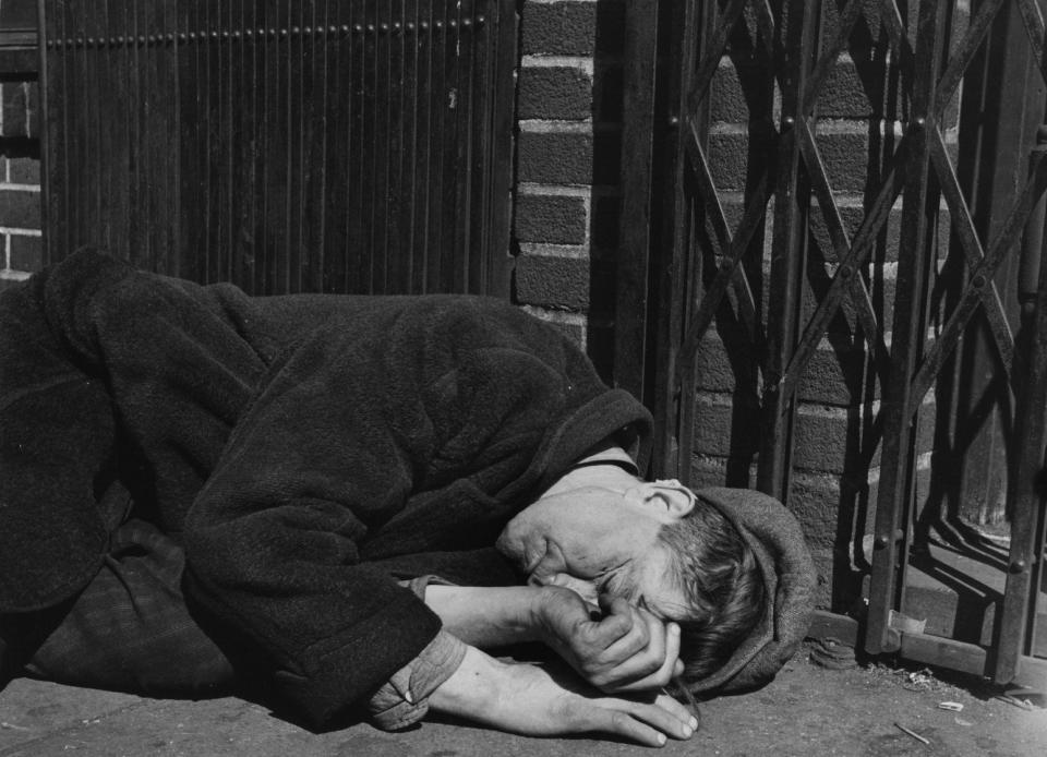 Great Depression man sleeping on street