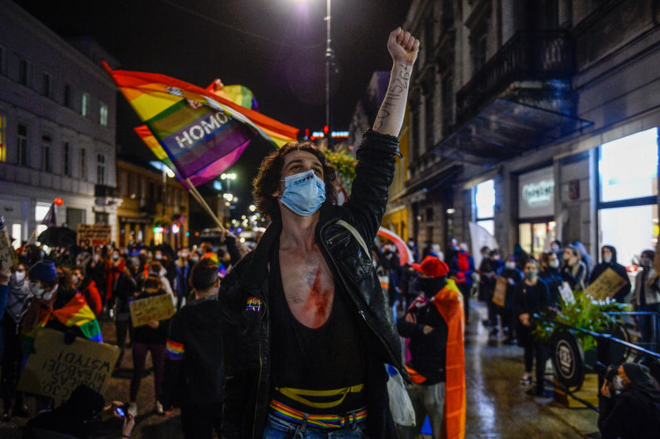 A man with the symbol of the women's strike painted on his chest shouts slogans as he continues to protest against the Constitutional Court ruling on tightening the abortion law in Warsaw on Oct. 29, 2020.<span class="copyright">Omar Marques—Getty Images</span>