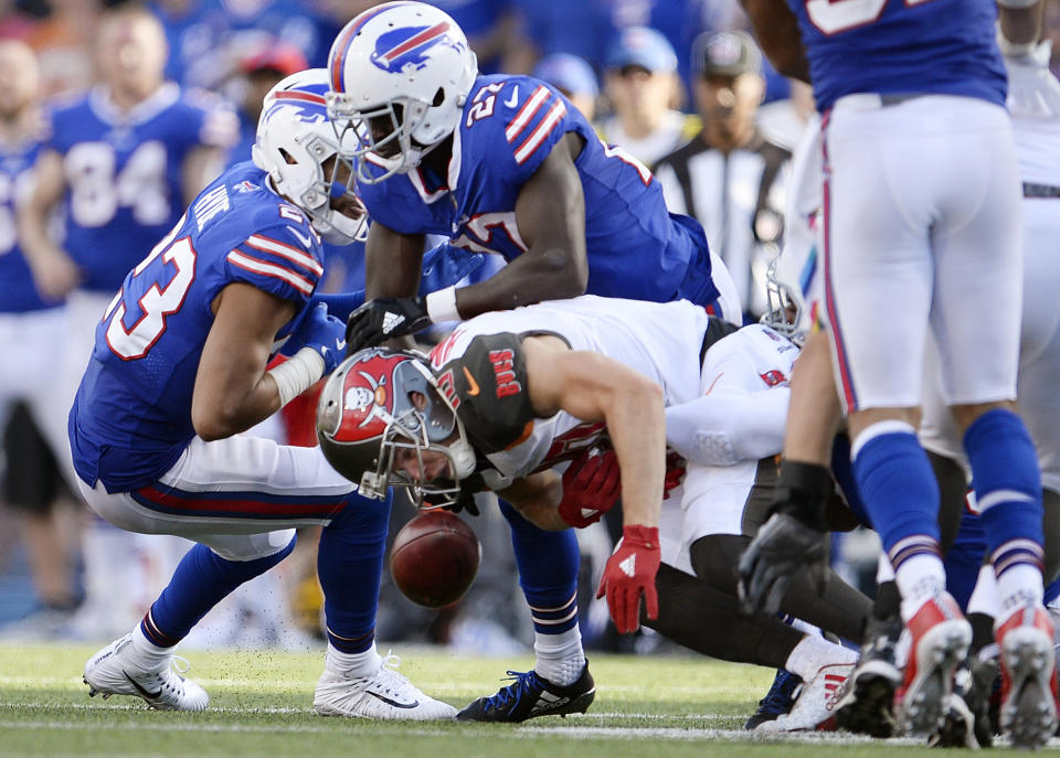<p>Tampa Bay Buccaneers wide receiver Adam Humphries (10) fumbles the ball during the second half of an NFL football game against the Buffalo Bills Sunday, Oct. 22, 2017, in Orchard Park, N.Y. Buffalo Bills cornerback Tre’Davious White (27) recovered the ball. (AP Photo/Adrian Kraus) </p>