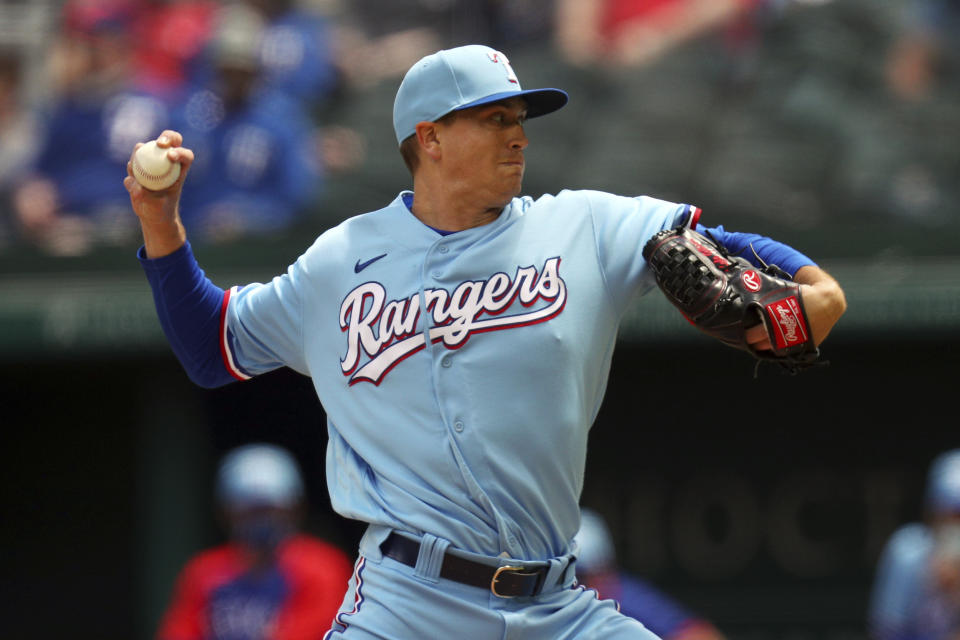 Texas Rangers starting pitcher Kyle Gibson (44) delivers a pitch against the Baltimore Orioles in the first inning during a baseball game on Sunday, April 18, 2021, in Dallas. (AP Photo/Richard W. Rodriguez)