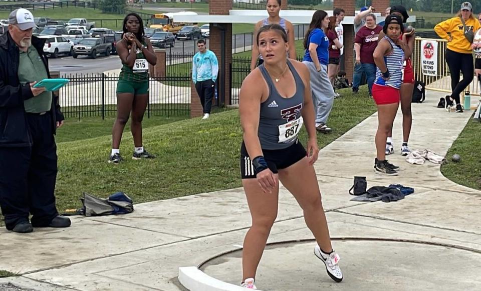Tates Creek’s Trinity Gottler watches the flight of her shot put during her first throw Saturday. She won the shot put and discus.