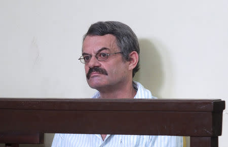 William John Endley, a South African national and an adviser to South Sudanese rebel leader Riek Machar, sits in the dock, in the High Court in Juba, South Sudan February 23, 2018. REUTERS/Samir Bol